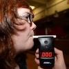 Woman blows breathalyzer